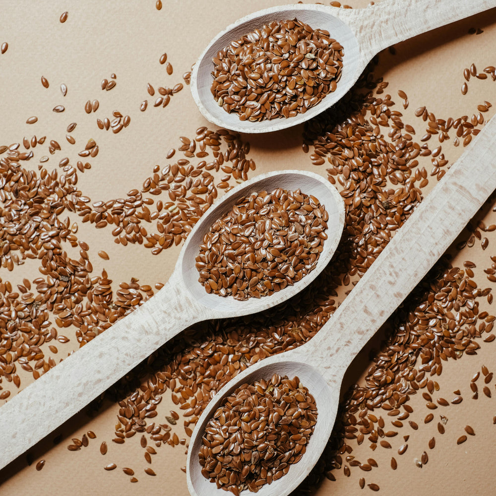 Premium organic whole brown flax seeds, ideal for adding fiber and nutrition to cereals, salads, and plant-based meals – Purely Organic Foods