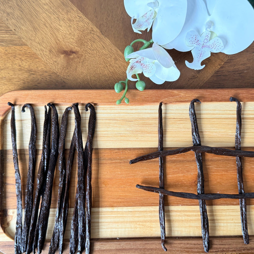 Organic vanilla beans with moist texture and fragrant seeds, perfect for culinary use or homemade extracts