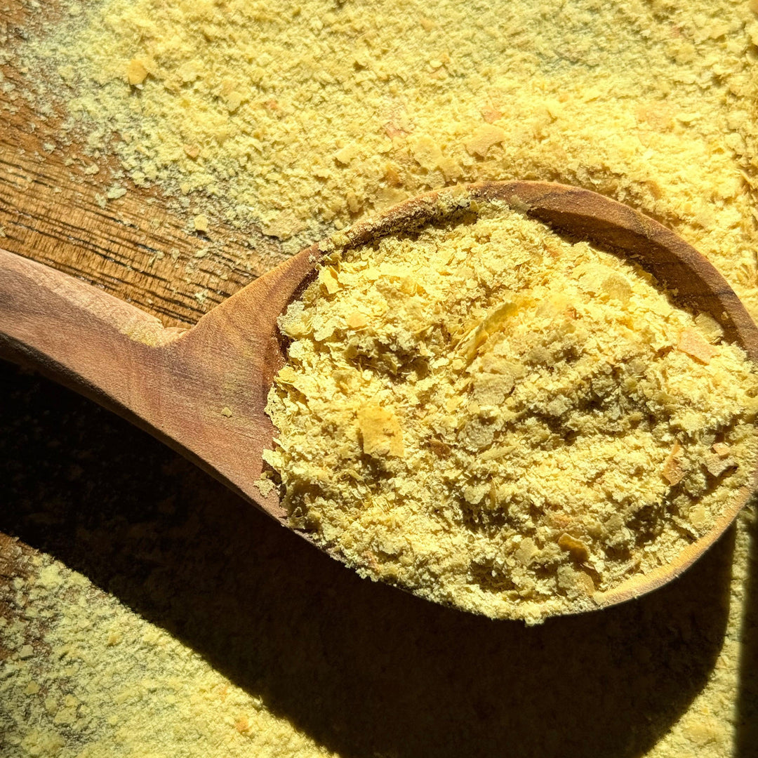 Organic nutritional yeast large flakes – a cheesy, savory vegan seasoning perfect for popcorn, pasta, and healthy recipes in Canada