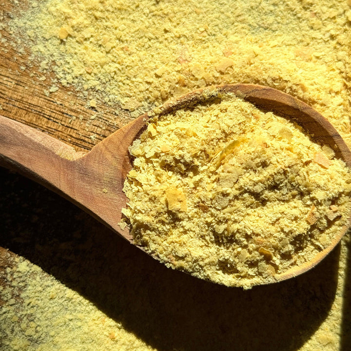 Organic nutritional yeast large flakes – a cheesy, savory vegan seasoning perfect for popcorn, pasta, and healthy recipes in Canada