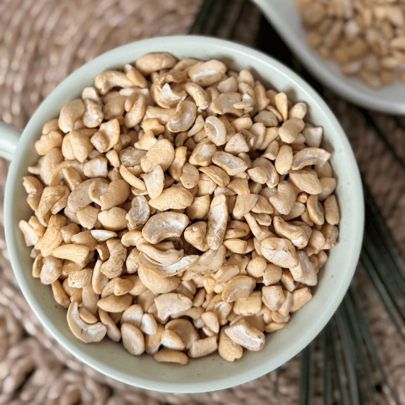 Purely Organic Foods organic cashew pieces in a bowl, lightly broken for convenience, perfect for baking, cooking, or topping salads and desserts."

"Close-up image of premium organic cashew nut pieces, ideal for culinary use, granolas, or dairy-free sauces, shown on a neutral background."

"Organic cashew pieces from Purely Organic Foods, certified organic and unsalted, captured in kraft packaging ready for bulk pantry use or cooking."