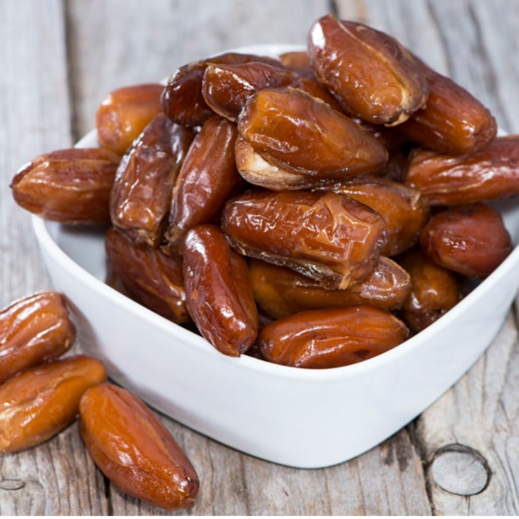Organic Deglet dates, pitted and naturally sweet, with a soft and chewy texture, perfect for snacking and baking