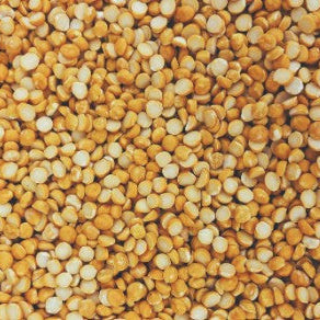 Organic Split Chick Peas (Channa Dal) in a wooden bowl