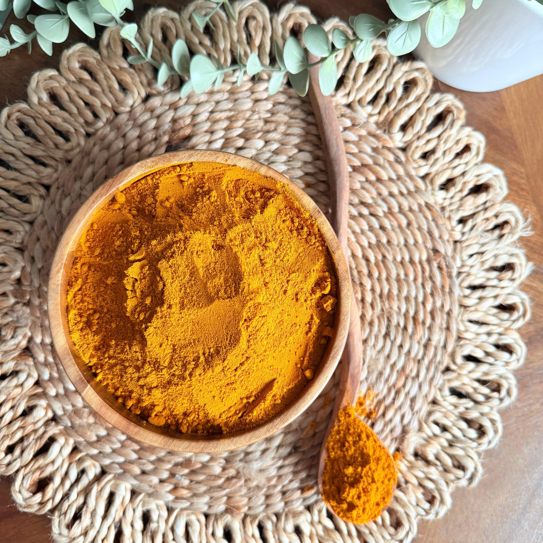 A close-up image of Purely Organic Foods' premium organic turmeric powder, made from ground curcuma longa root, ideal for culinary use and natural food coloring
