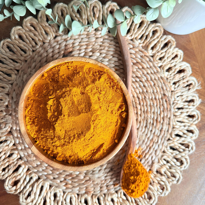 A close-up image of Purely Organic Foods' premium organic turmeric powder, made from ground curcuma longa root, ideal for culinary use and natural food coloring