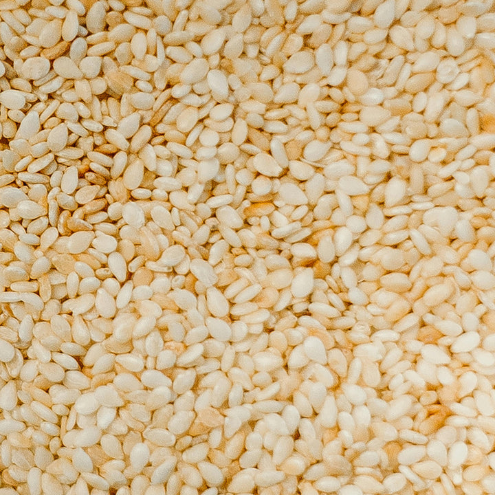 Organic white hulled sesame seeds, nutrient-rich and versatile for cooking, baking, and garnishing – Purely Organic Foods
