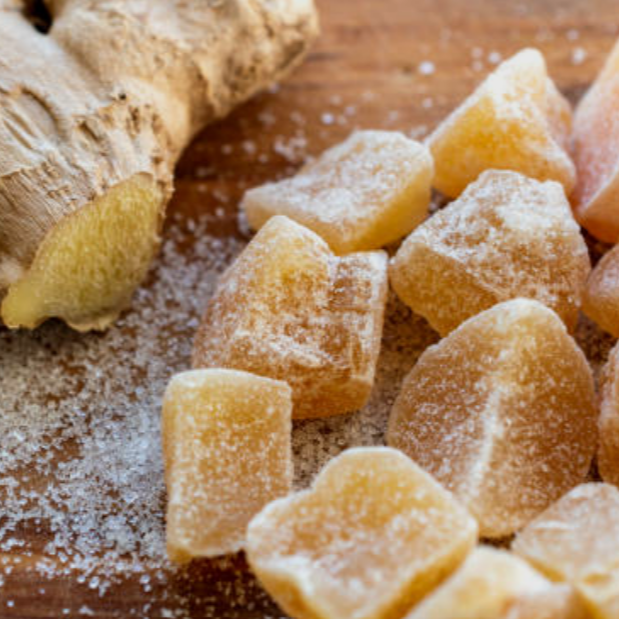 Purely Organic Foods organic ginger cubes, lightly dusted and small, with a spicy, zesty flavor, perfect for snacking, cooking, and adding a natural kick to recipes