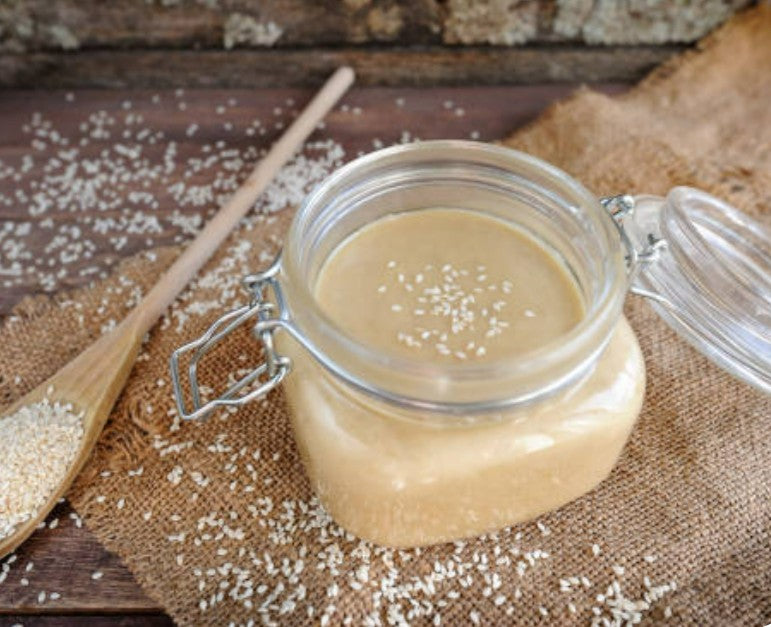 Organic raw tahini made from natural sesame seeds, perfect for cooking, baking, and healthy spreads – Purely Organic Foods
