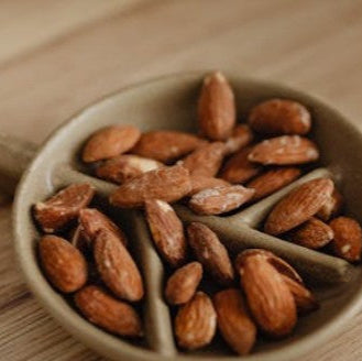 Premium roasted almonds, rich in taste and nutrients, ideal for desserts, salads, and on-the-go snacks – Purely Organic Foods