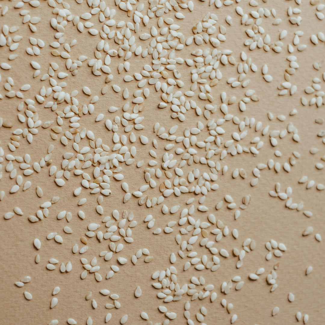 Premium organic hulled white sesame seeds, perfect for salads, breads, Asian dishes, and healthy recipes – Purely Organic Foods