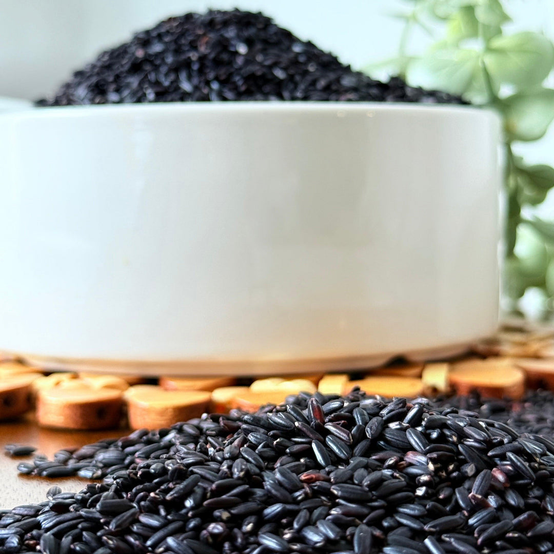 Purely Organic Foods organic black rice in eco-friendly packaging, a whole grain rice variety known for its nutty flavor and striking dark color.