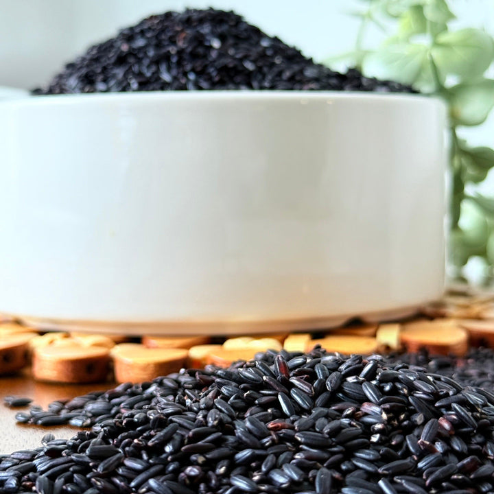 Purely Organic Foods organic black rice in eco-friendly packaging, a whole grain rice variety known for its nutty flavor and striking dark color.