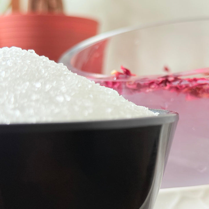 Natural Epsom salt crystals, magnesium-rich and multipurpose for home, garden, or bath applications"

"High-quality Epsom salt in bulk packaging, ideal for bath rituals, relaxation, or household uses"

"Pure and natural Epsom salt, fine grain magnesium sulfate perfect for soaking tired muscles or DIY recipes"