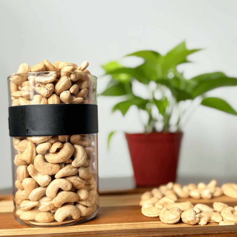 Whole organic cashew nuts from Purely Organic Foods, displayed in a bowl, creamy in color and texture, ideal for clean snacking or cooking use."

"Certified organic whole cashews with smooth, crescent shapes and light beige color, photographed on a rustic table for natural food branding."